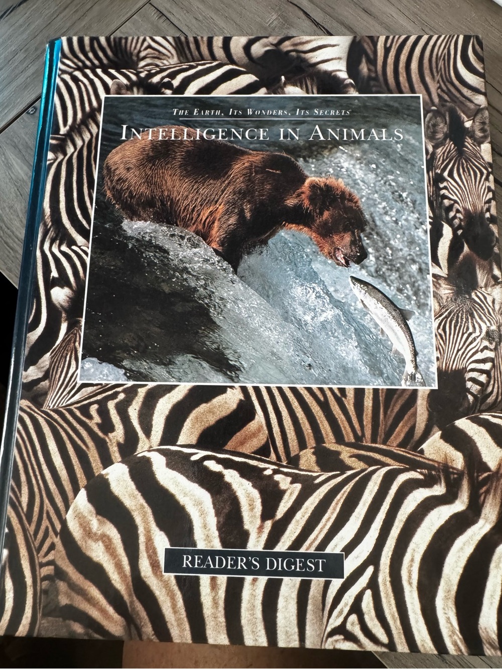 Reader's Digest Intelligence in Animals Hardcover Book - Brown/Black Zebra Cover